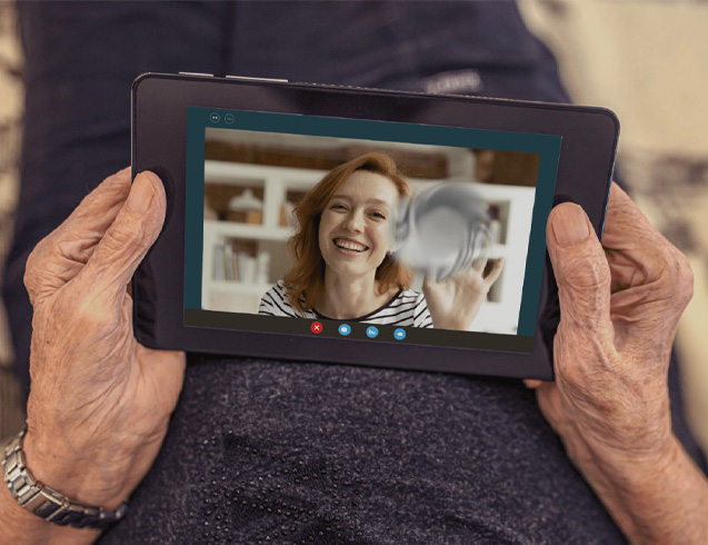 images of patient with GA looking at tablet