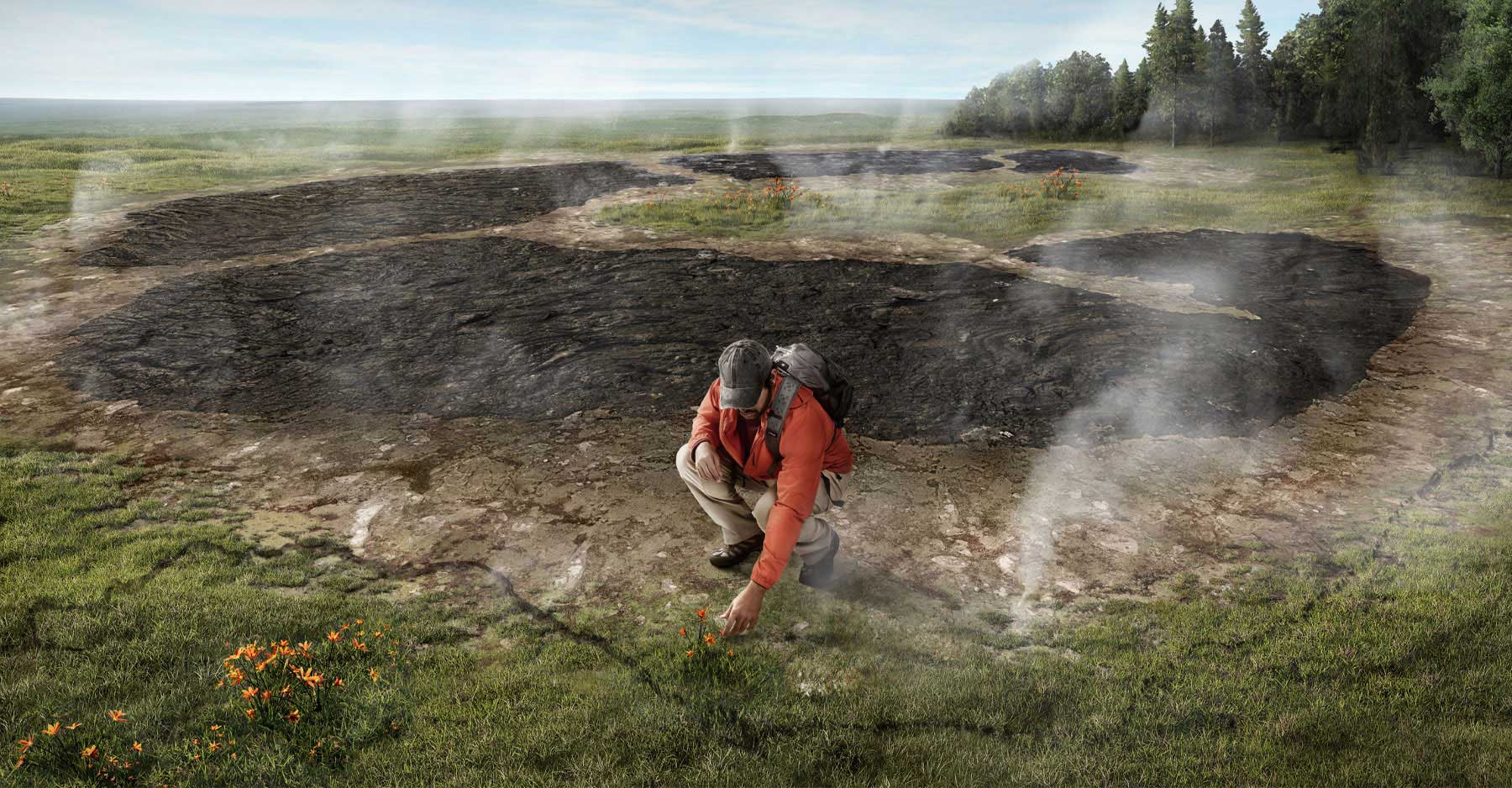 Photo of person hiking on scorched ground.